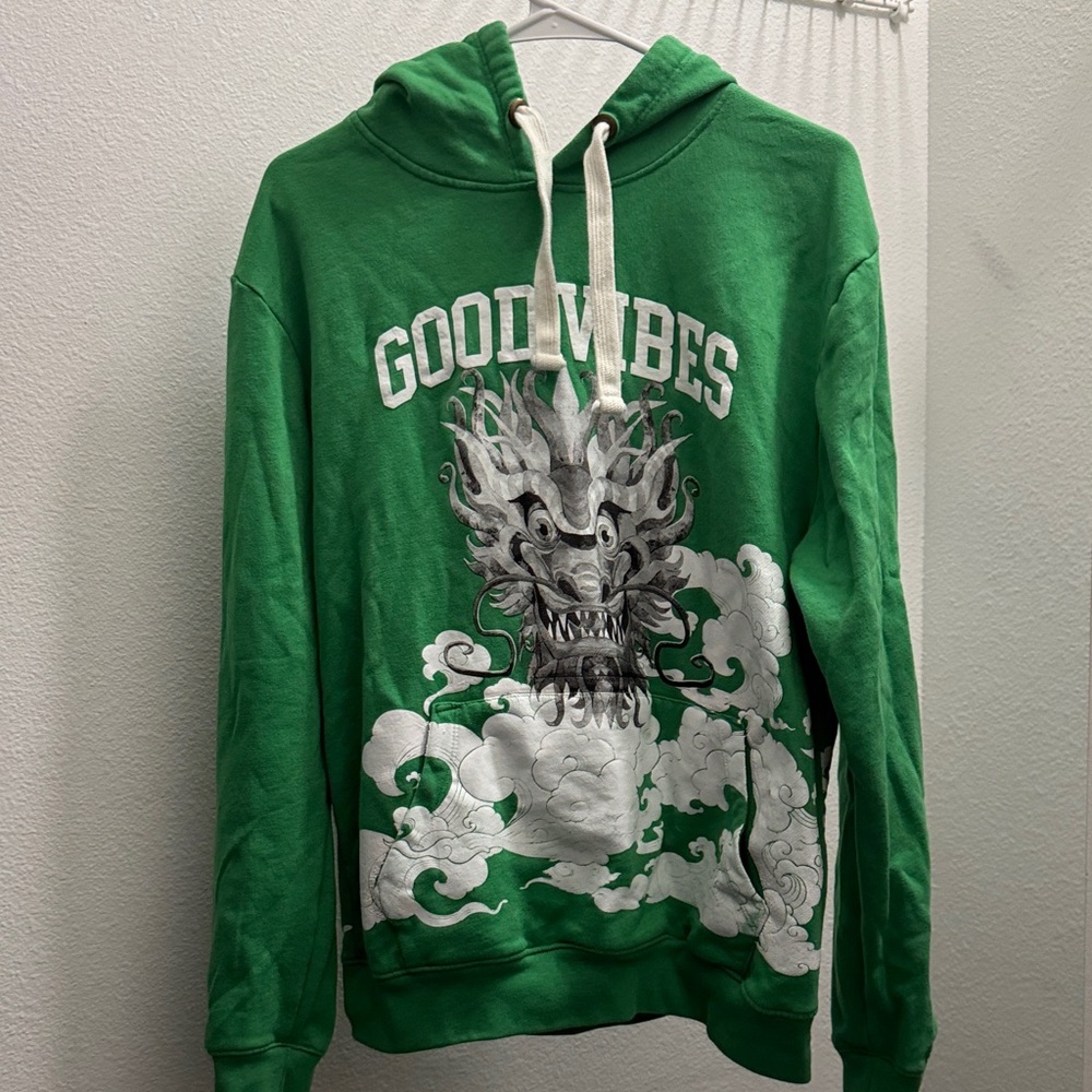 Vibrant Green Hoodie with Dragon Graphic